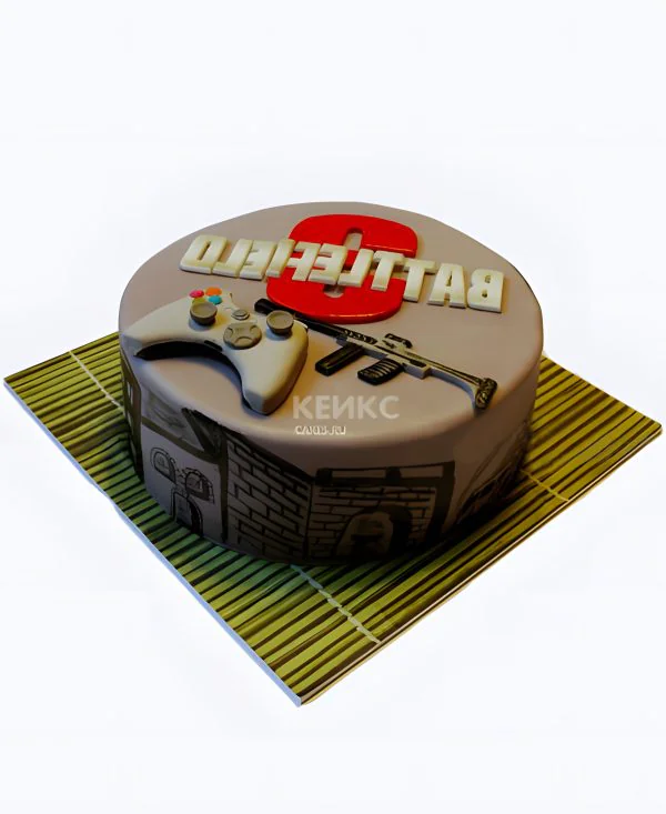 Торт с игровым джойстиком и ружьем Торт с игровым джойстиком и ружьем Фото
