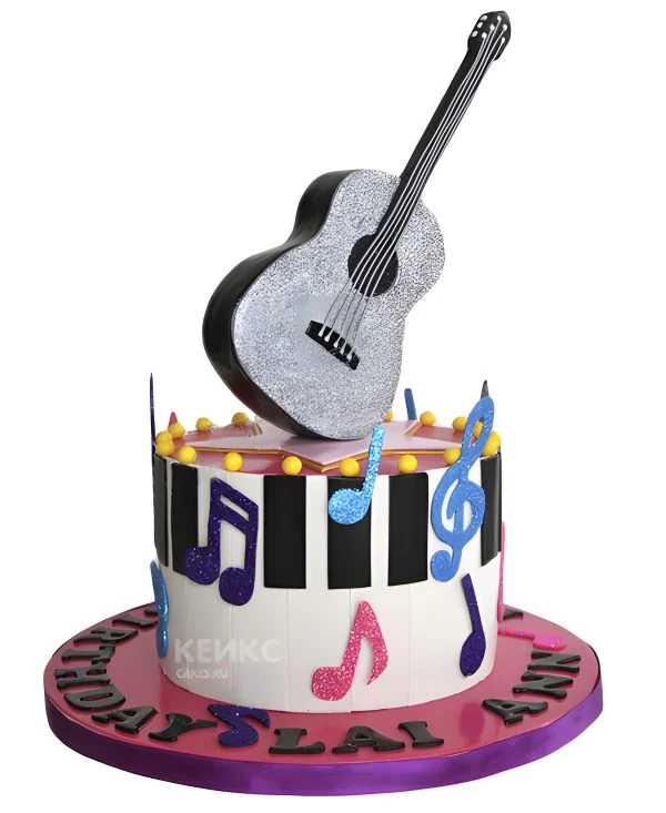 Торт пианино с гитарой и нотами Фото