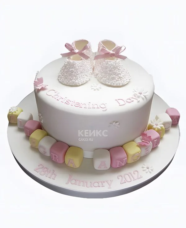 Торт с белыми кружевными пинетками Торт с белыми кружевными пинетками Фото