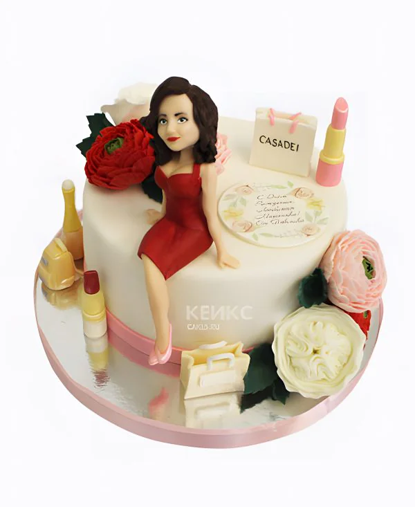 Красивый белый торт с дамой в красном Красивый белый торт с дамой в красном Фото