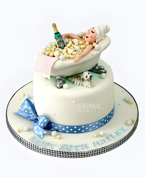 Белый торт с дамой в ванной Белый торт с дамой в ванной Фото