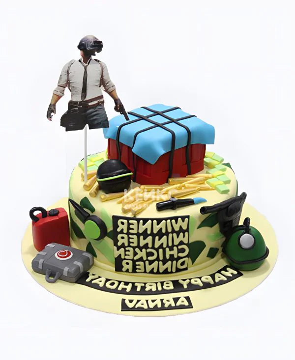 Разноцветный торт с фигуркой персонажа Разноцветный торт с фигуркой персонажа Фото