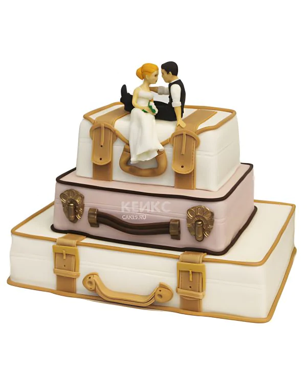 Оригинальный торт с фигурками жениха и невесты на чемоданах Оригинальный торт с фигурками жениха и невесты на чемоданах Фото