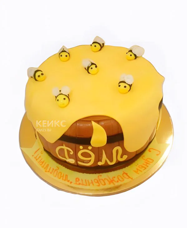 Желтый торт с сотами и пчелами Фото