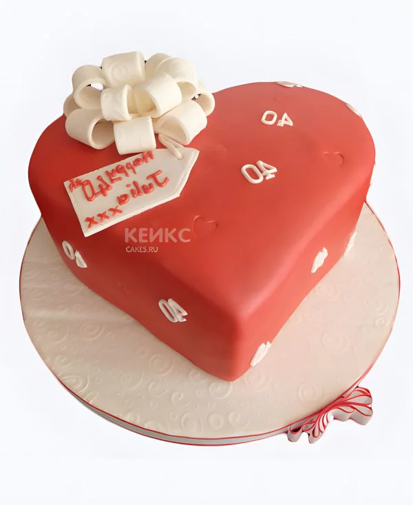 Торт в виде сердца с бантом Фото
