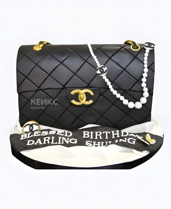 Впечатляющий торт в виде сумки шанель Впечатляющий торт в виде сумки шанель Фото