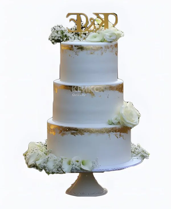 Очень красивый белый свадебный торт трехъярусный Фото
