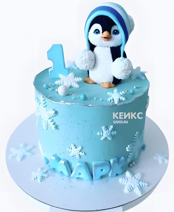 Голубой торт с пингвином и снежинками Голубой торт с пингвином и снежинками Фото