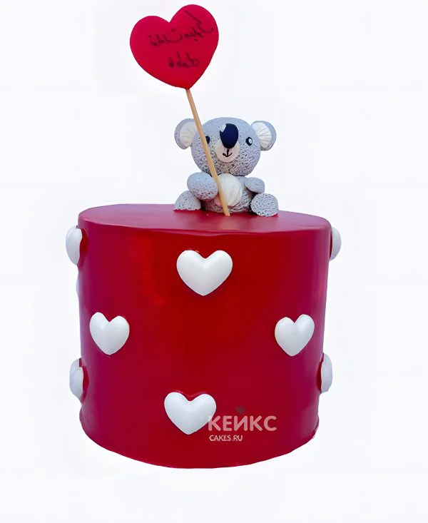 Милый красный торт с коалой Милый красный торт с коалой Фото