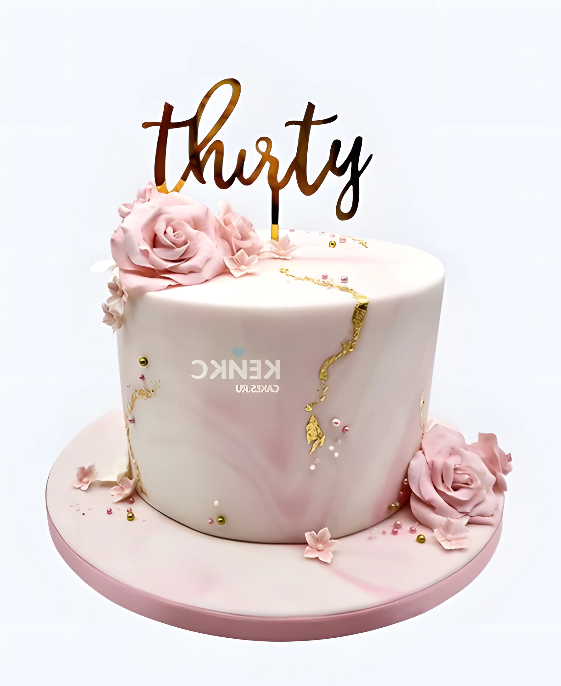 Мраморно розовый торт с цветами и топпером Фото