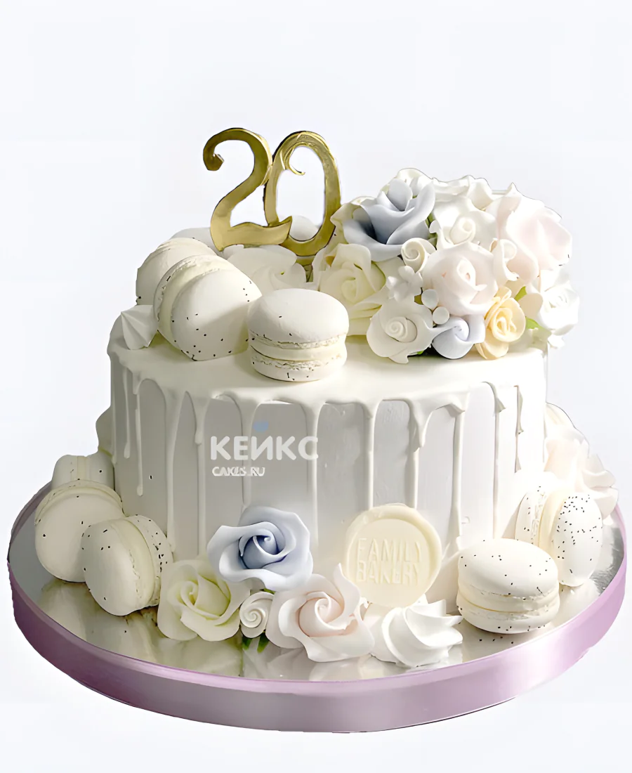 Нежно белый торт на 20 лет с макарунс и цветами Нежно белый торт на 20 лет с макарунс и цветами Фото