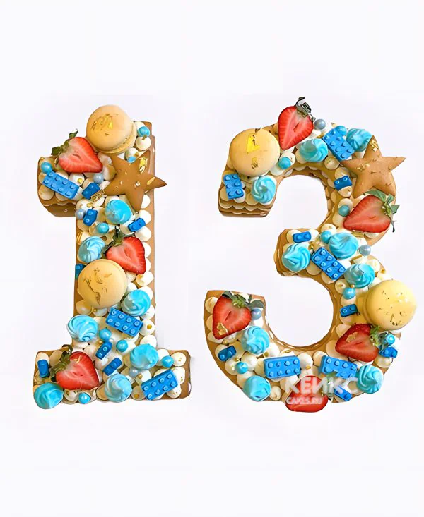 Торт цифра 13 с ярко-голубым украшением Торт цифра 13 с ярко-голубым украшением Фото