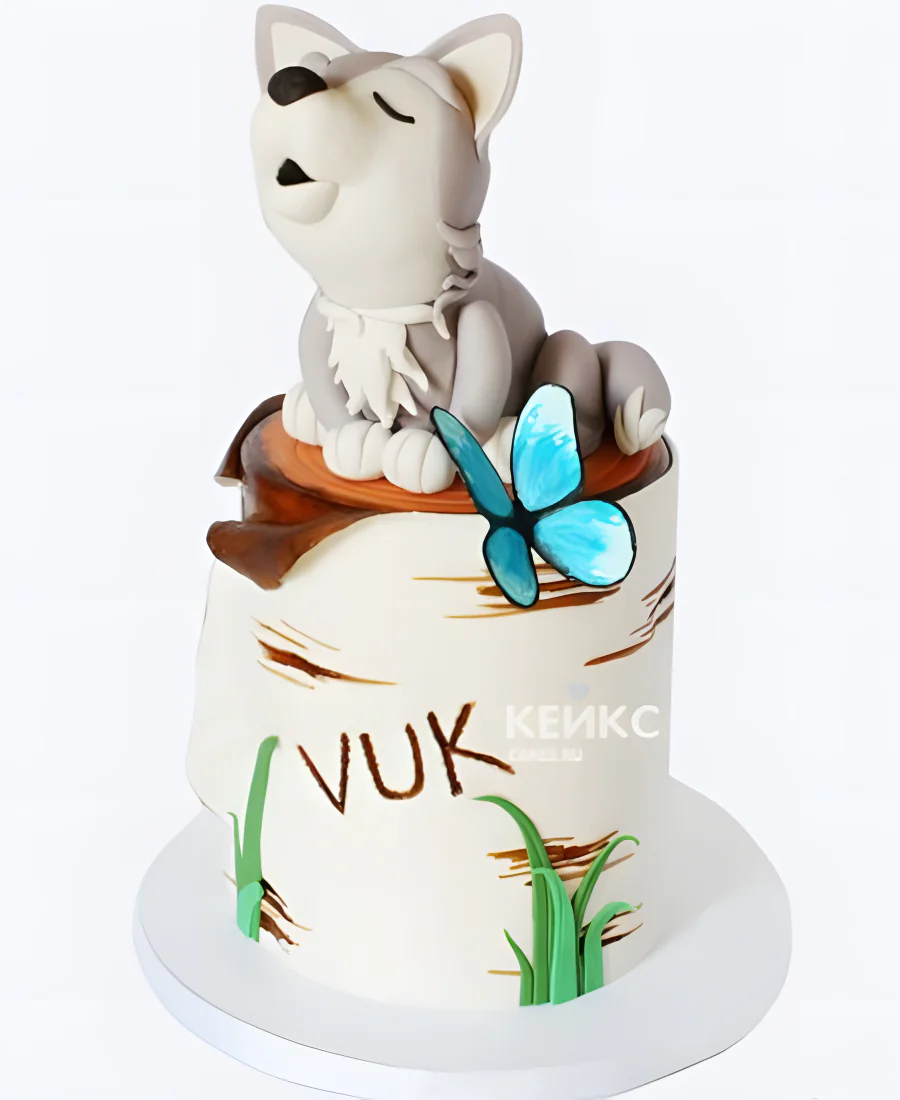 Торт в виде пенька с фигуркой волка Торт в виде пенька с фигуркой волка Фото