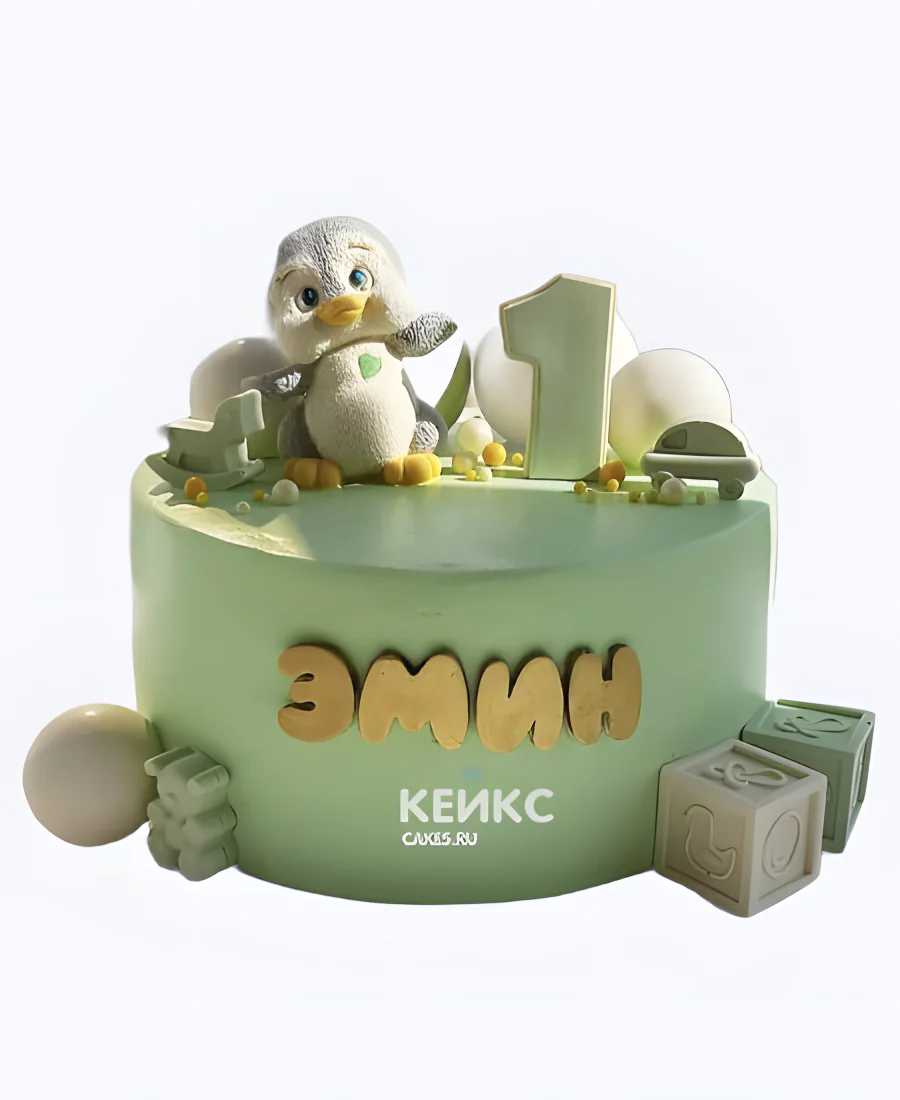 Зеленый торт с пингвином и кубиками Зеленый торт с пингвином и кубиками Фото