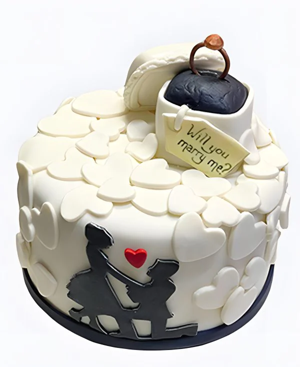 Белый торт с кольцом и сердечками на сватовство Белый торт с кольцом и сердечками на сватовство Фото