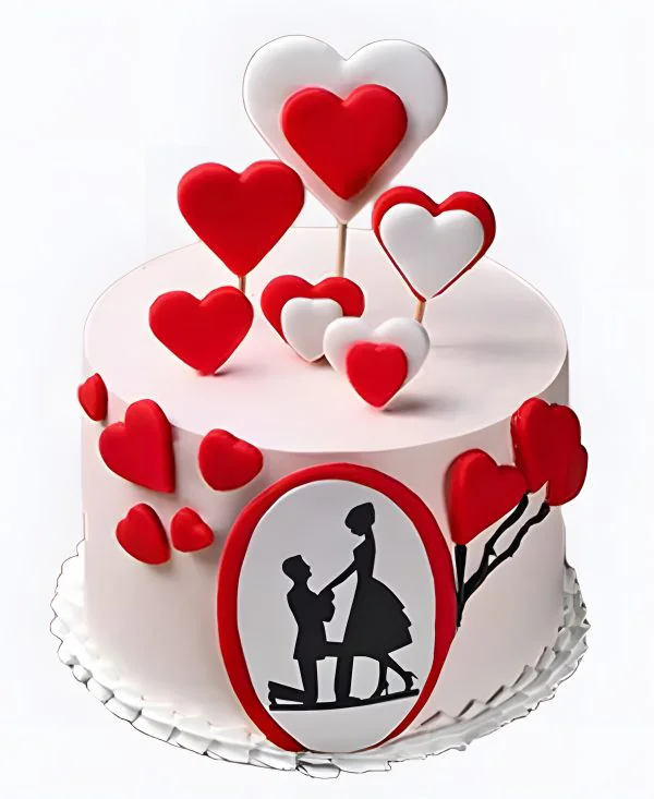 Белый торт с влюбленными и сердцами на сватовство Белый торт с влюбленными и сердцами на сватовство Фото