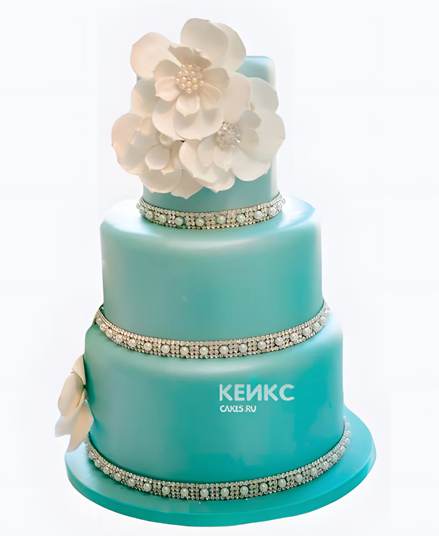 Бирюзовый свадебный торт с ожерельем и цветами Бирюзовый свадебный торт с ожерельем и цветами Фото