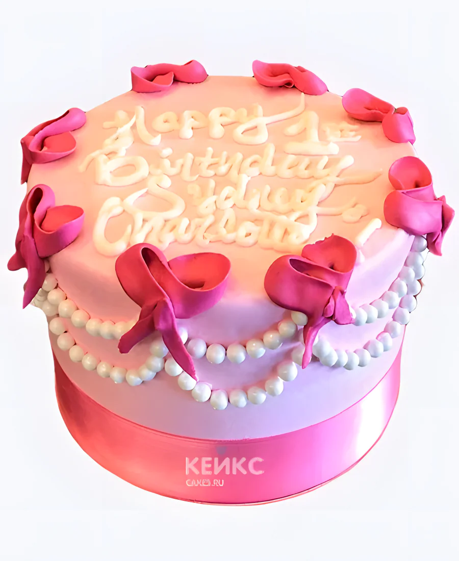 Чудесный розовый тортик с бантиками на первый день рождения девочки Чудесный розовый тортик с бантиками на первый день рождения девочки Фото