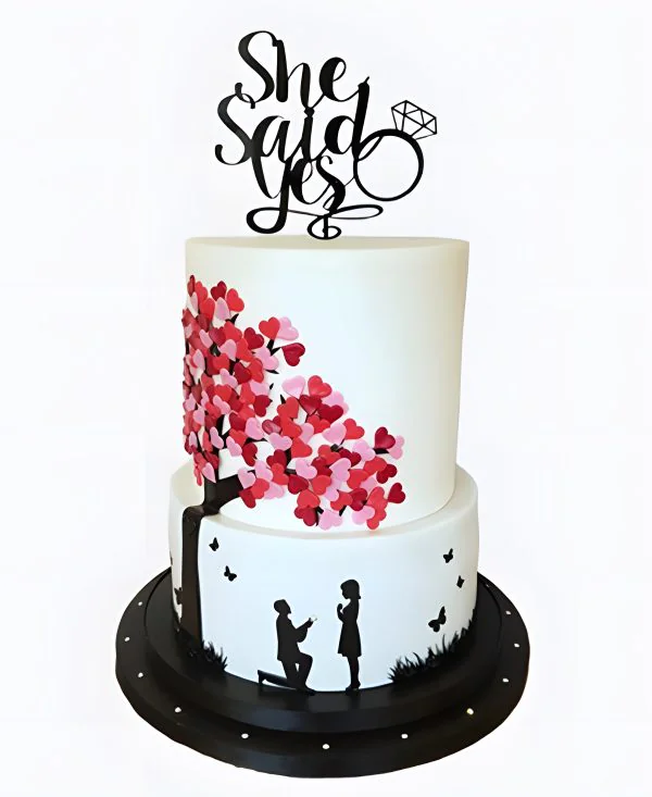 Двухъярусный торт на сватовство с силуэтами влюбленных Двухъярусный торт на сватовство с силуэтами влюбленных Фото