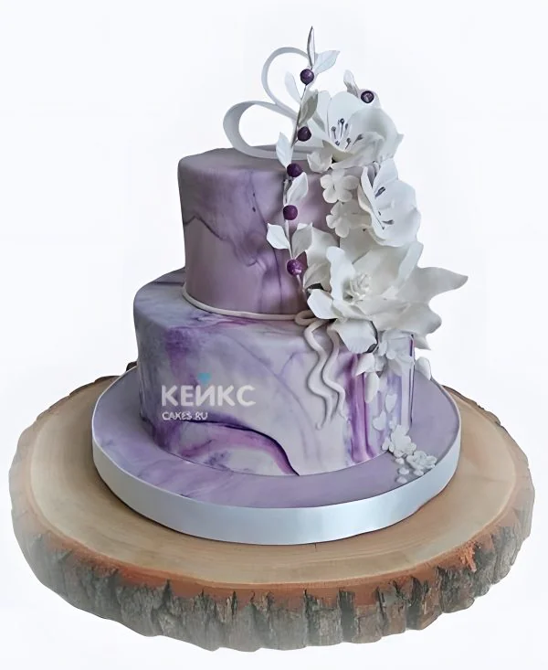Фиолетовый свадебный торт Белые цветы Фиолетовый свадебный торт Белые цветы Фото