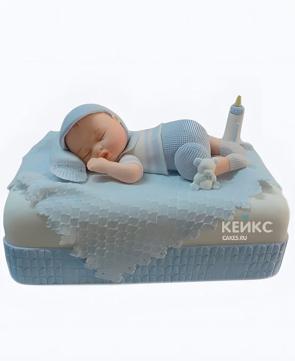 Красивый торт с фигуркой младенца на рождение ребенка Фото