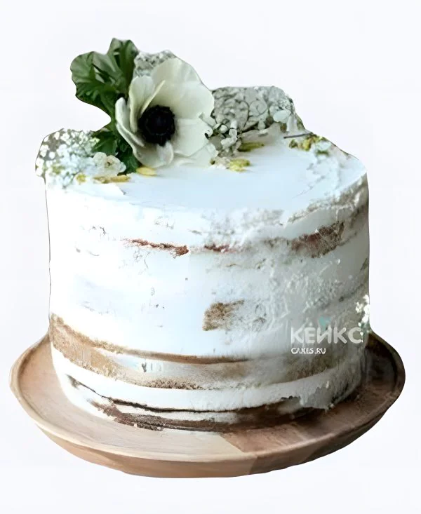 Маленький свадебный торт открытый с белым цветком Маленький свадебный торт открытый с белым цветком Фото