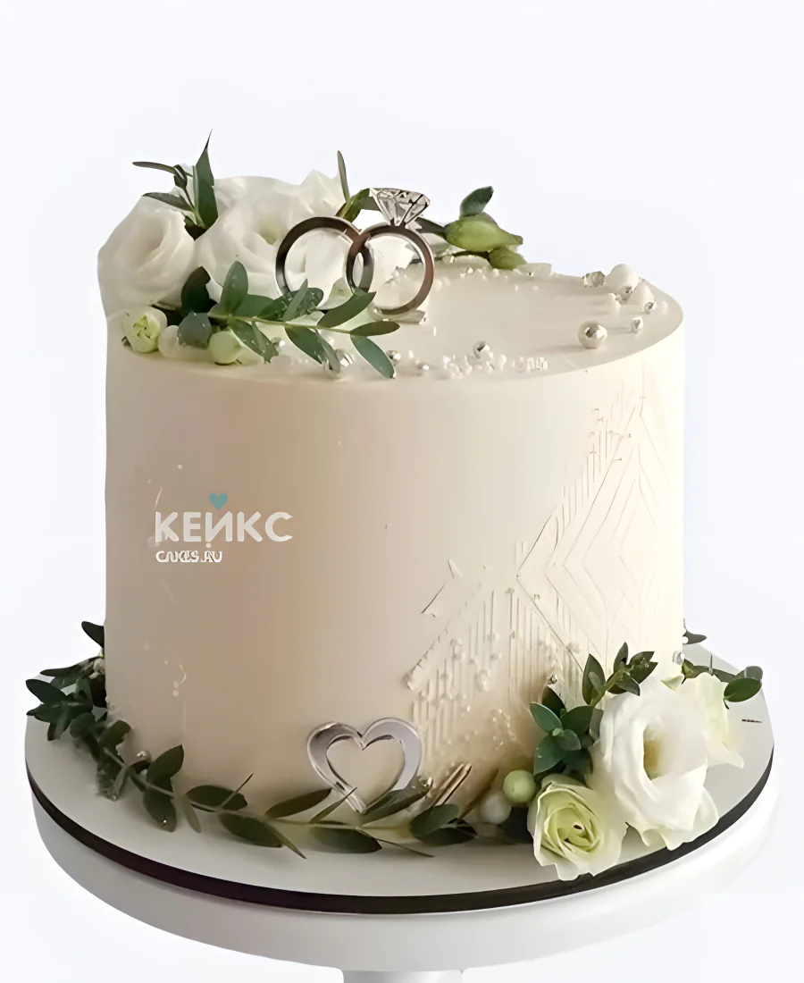 Недорогой свадебный торт с кольцами и розами Недорогой свадебный торт с кольцами и розами Фото