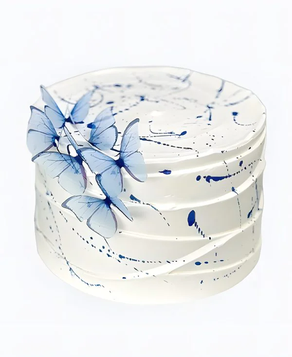 Рифленый торт с голубыми бабочками Фото