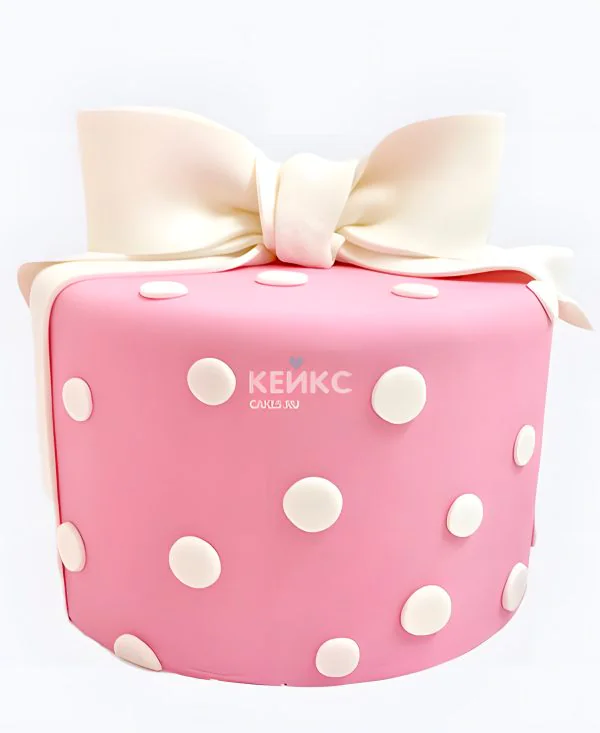 Розовый торт в горошек с бантиком Розовый торт в горошек с бантиком Фото