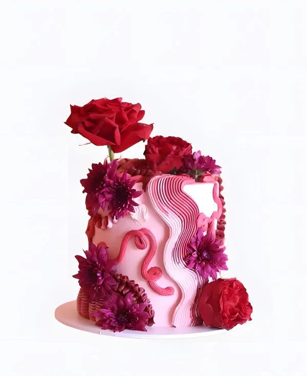 Розовый трендовый торт на свадьбу с яркими цветами Розовый трендовый торт на свадьбу с яркими цветами Фото