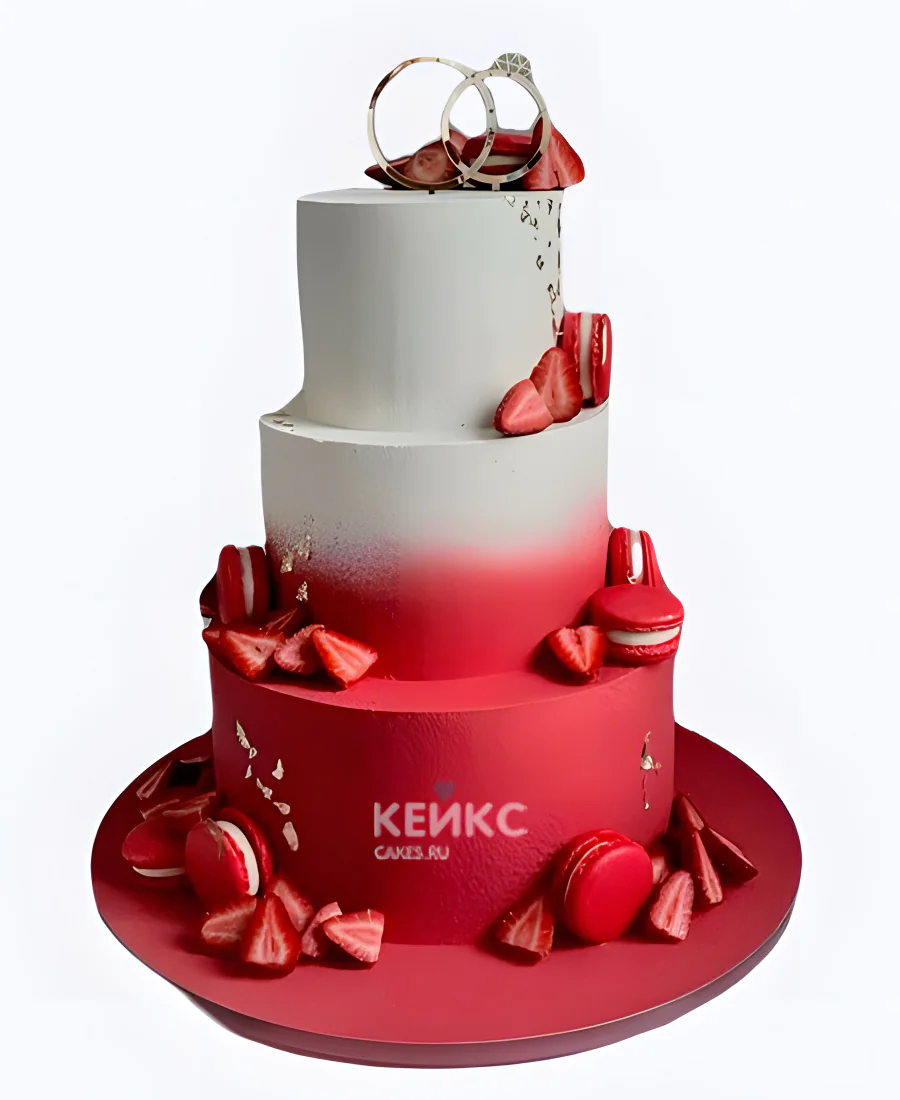 Свадебный красный торт с макарун клубникой и кольцами Свадебный красный торт с макарун клубникой и кольцами Фото