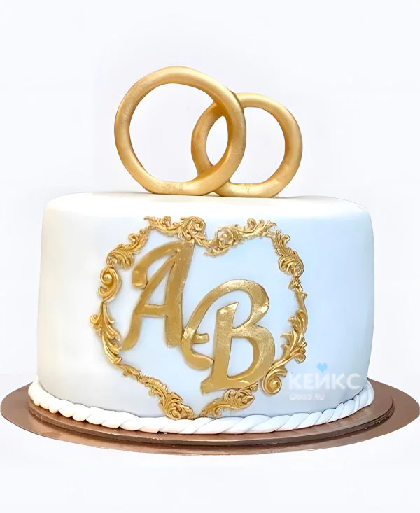 Одноярусный свадебный торт с инициалами и кольцами Фото