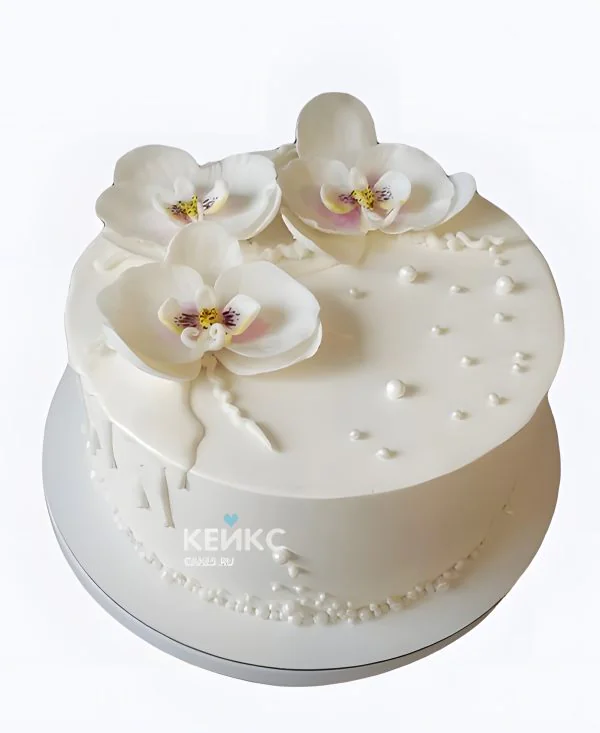 Свадебный торт с орхидеями и жемчугом Фото