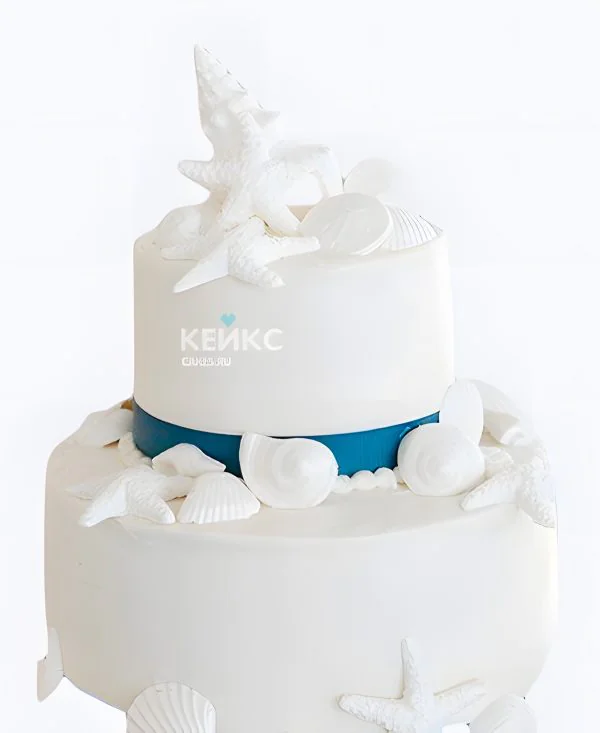 Свадебный торт в морском стиле Белые ракушки с голубой лентой Свадебный торт в морском стиле Белые ракушки с голубой лентой Фото