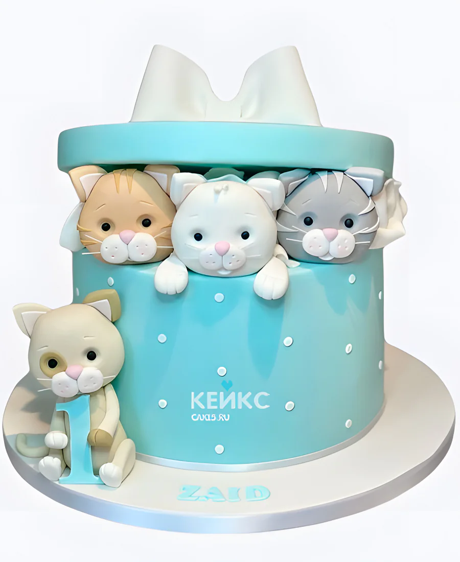 Торт девочке в виде голубой коробки с котиками Фото