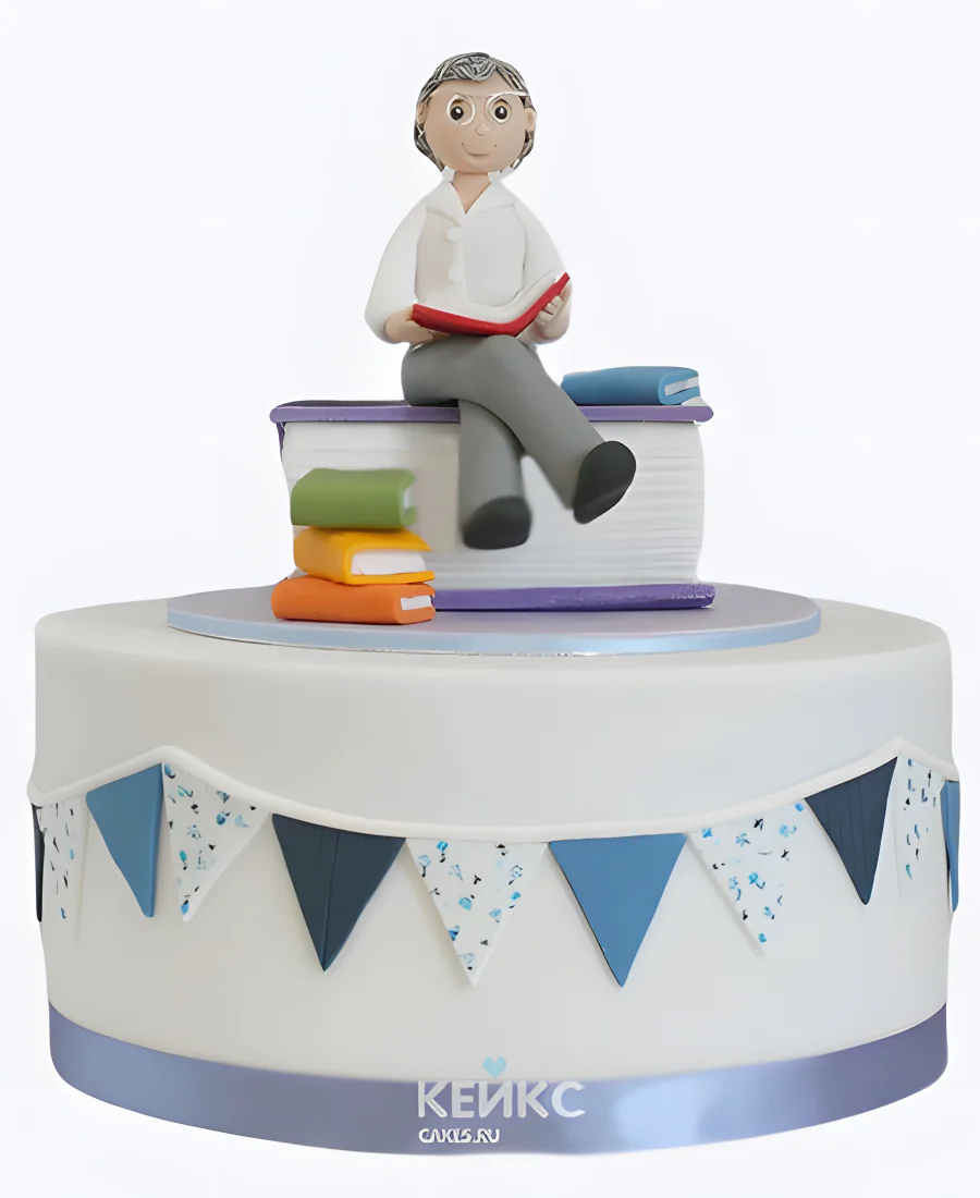 Торт на День воспитателя с фигуркой книгами и растяжкой Торт на День воспитателя с фигуркой книгами и растяжкой Фото