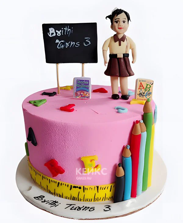 Торт на День воспитателя с фигуркой табличкой и карандашами Фото