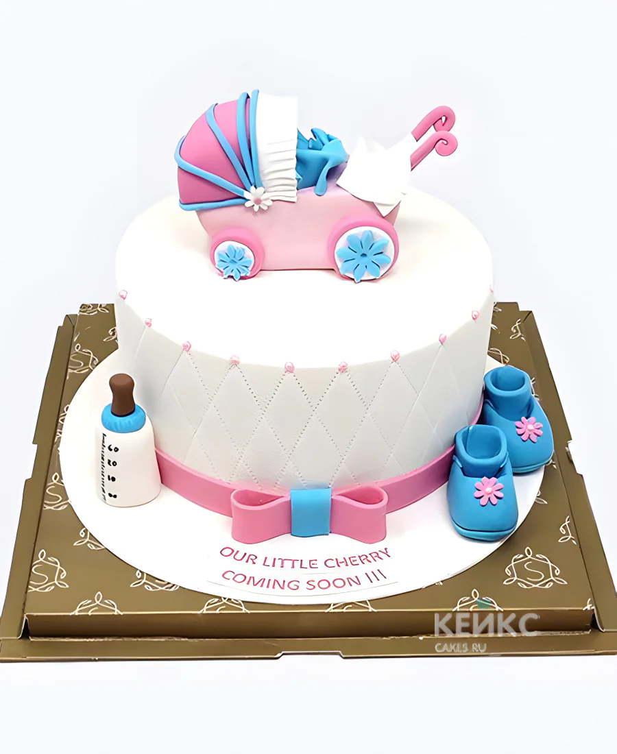 Торт на рождение ребенка с коляской и бантиком Фото
