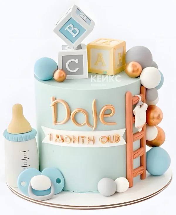 Торт на рождение ребенка с кубиками и шариками Фото