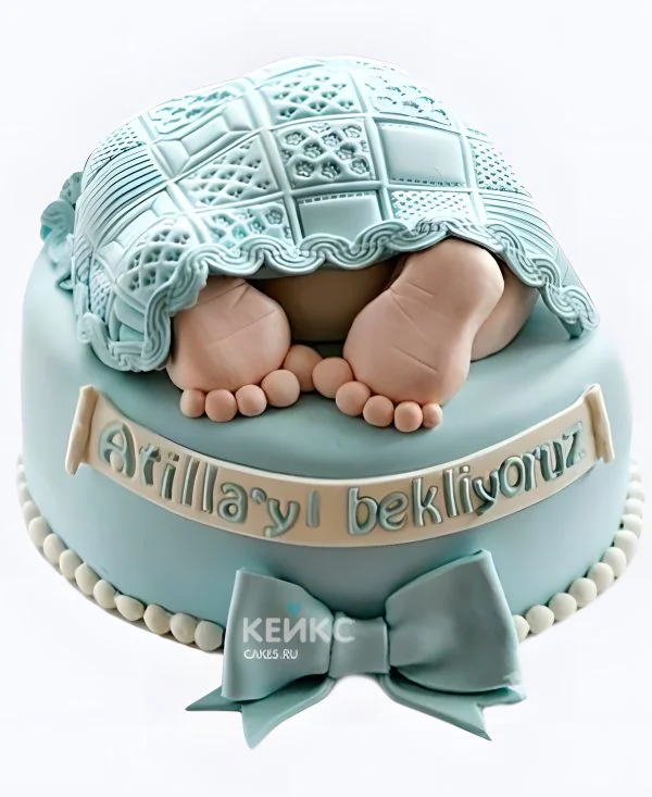 Торт на рождение ребенка с младенцем под ажурным одеялом Фото