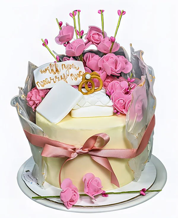 Торт на сватовство с яркими цветами и кольцами Торт на сватовство с яркими цветами и кольцами Фото