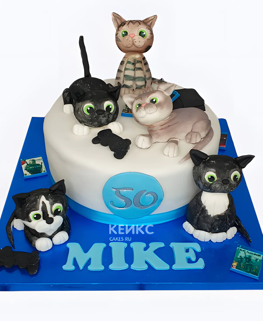 Торт с фигурками кошек для девочки Фото