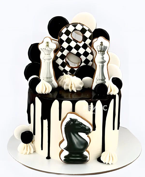 Торт шахматы с черно-белыми леденцами Торт шахматы с черно-белыми леденцами Фото