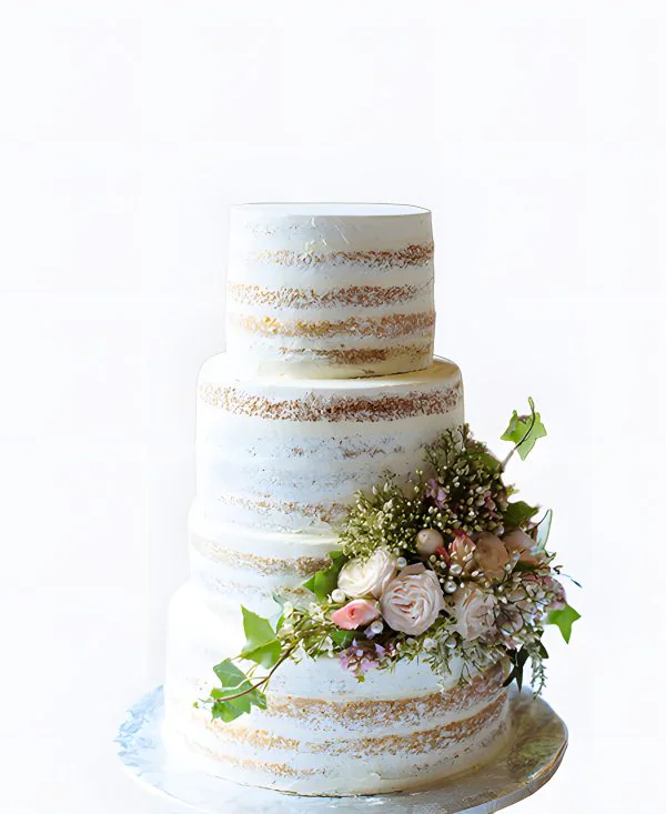 Трендовый торт на свадьбу с открытыми коржами и букетом цветов Трендовый торт на свадьбу с открытыми коржами и букетом цветов Фото