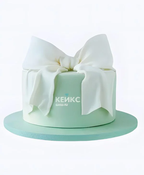 Зеленый тортик с объемным бантиком Зеленый тортик с объемным бантиком Фото