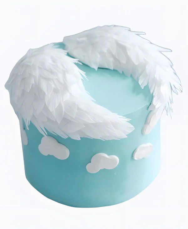 Голубой торт с крыльями ангела Фото