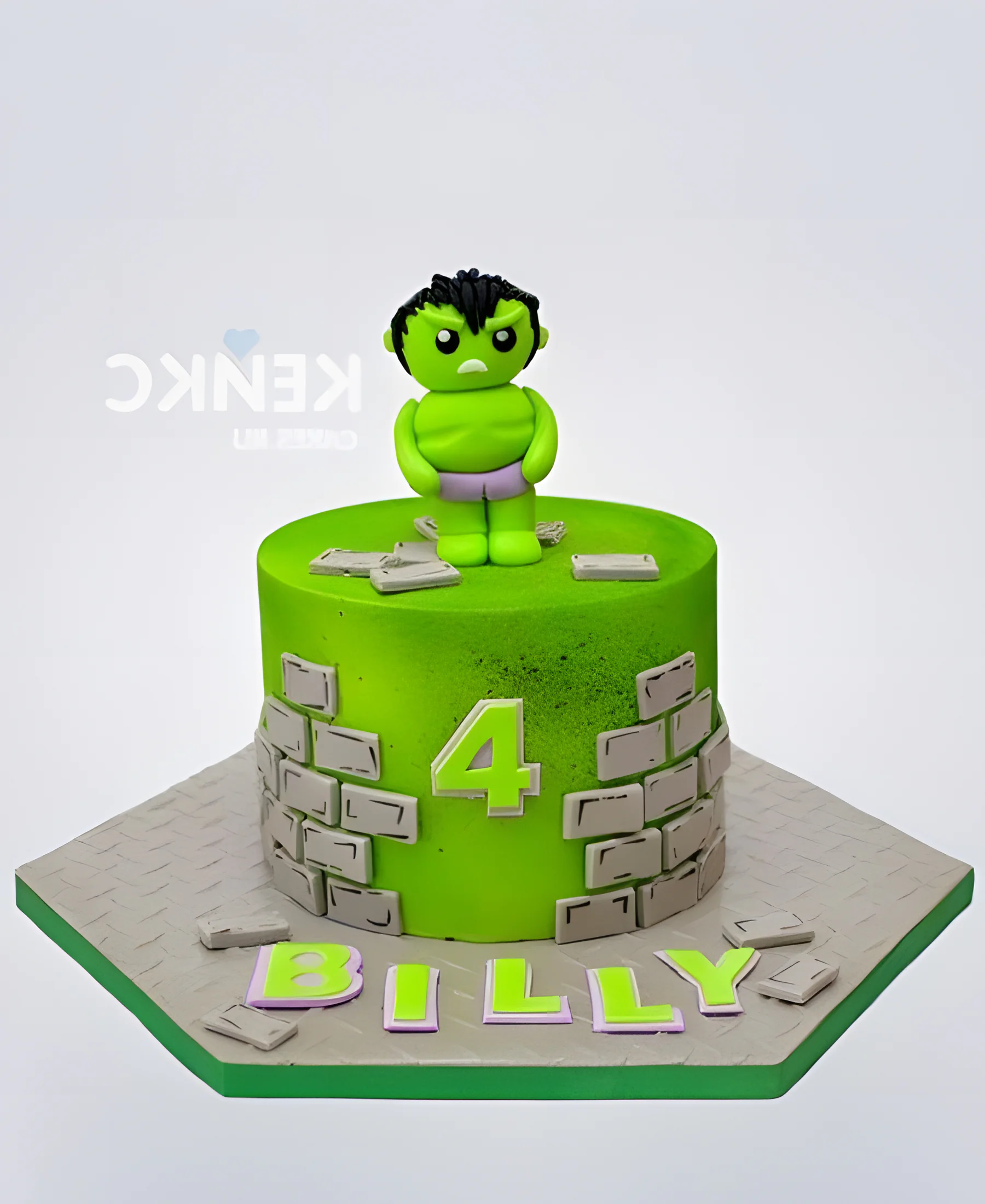Ярко-зеленый торт с фигуркой Халка и кирпичами Фото