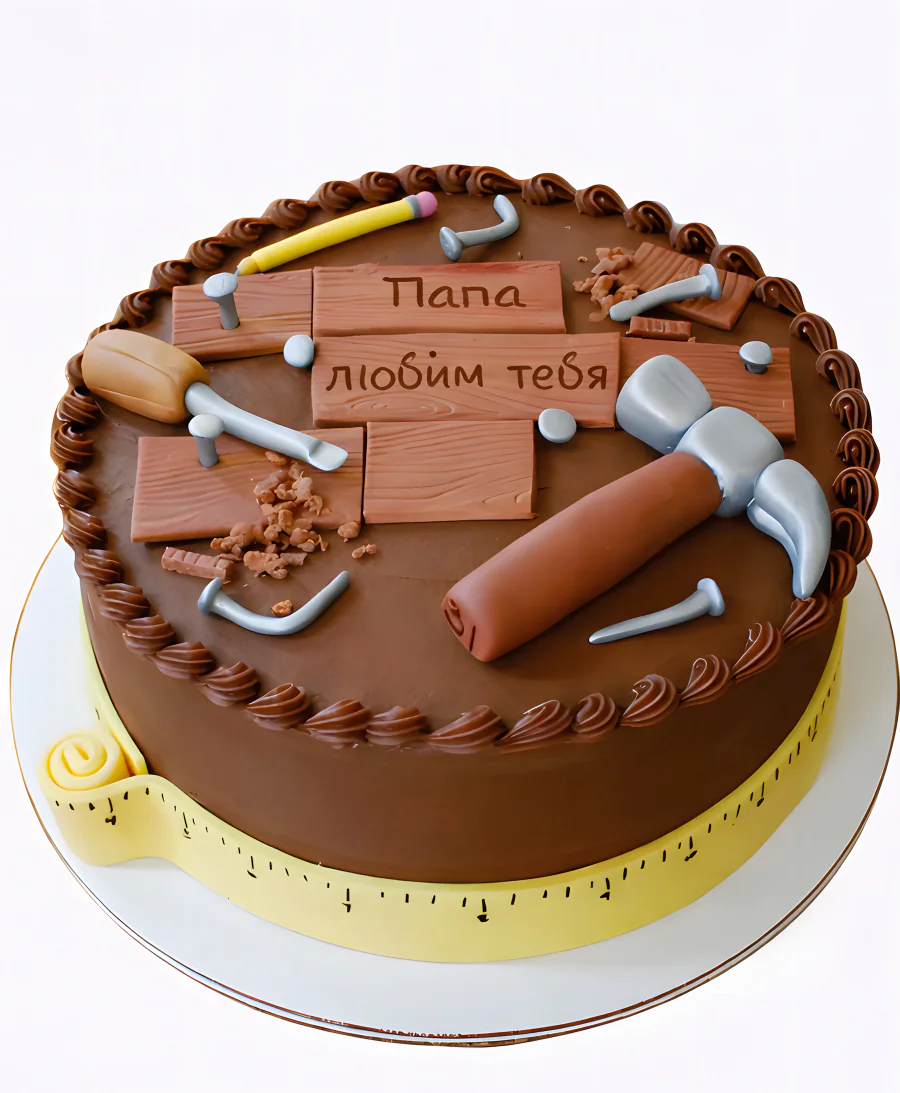 Шоколадный торт с инструментами из мастики Фото