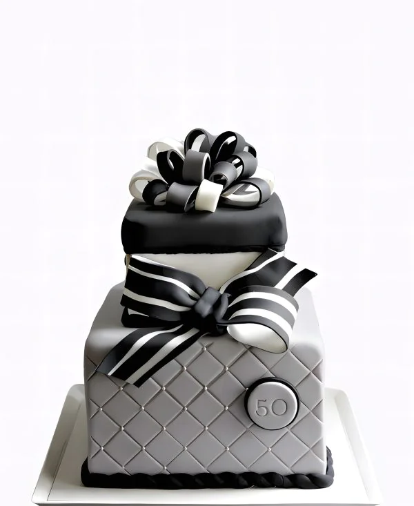 Торт в черно-белом цвете с бантиком Фото