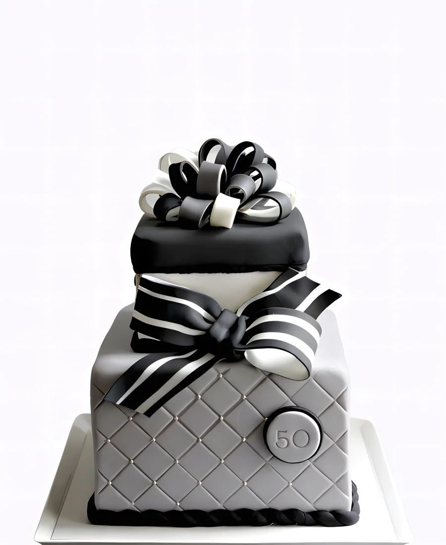 Торт в черно-белом цвете с бантиком Фото